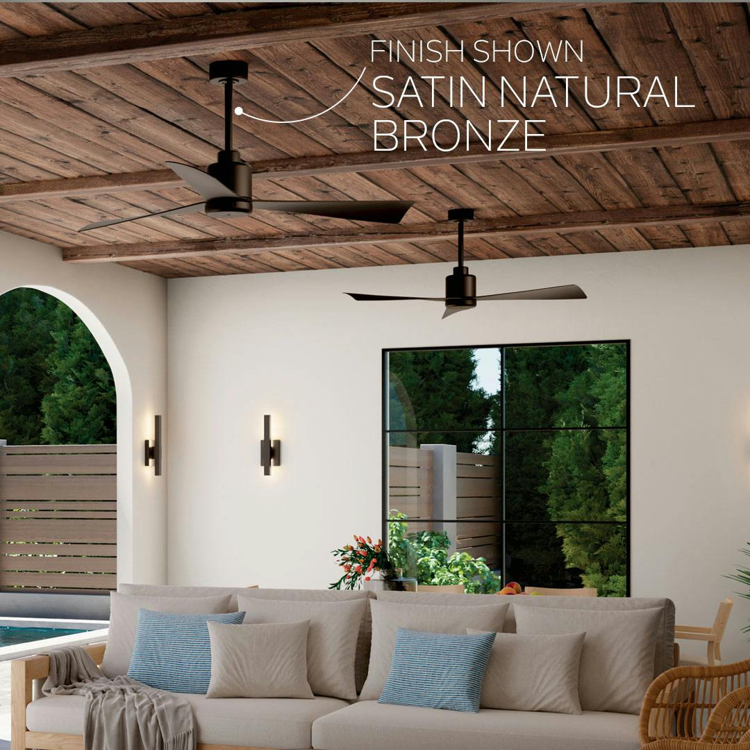 Living room featuring True ceiling fans in satin natural bronze