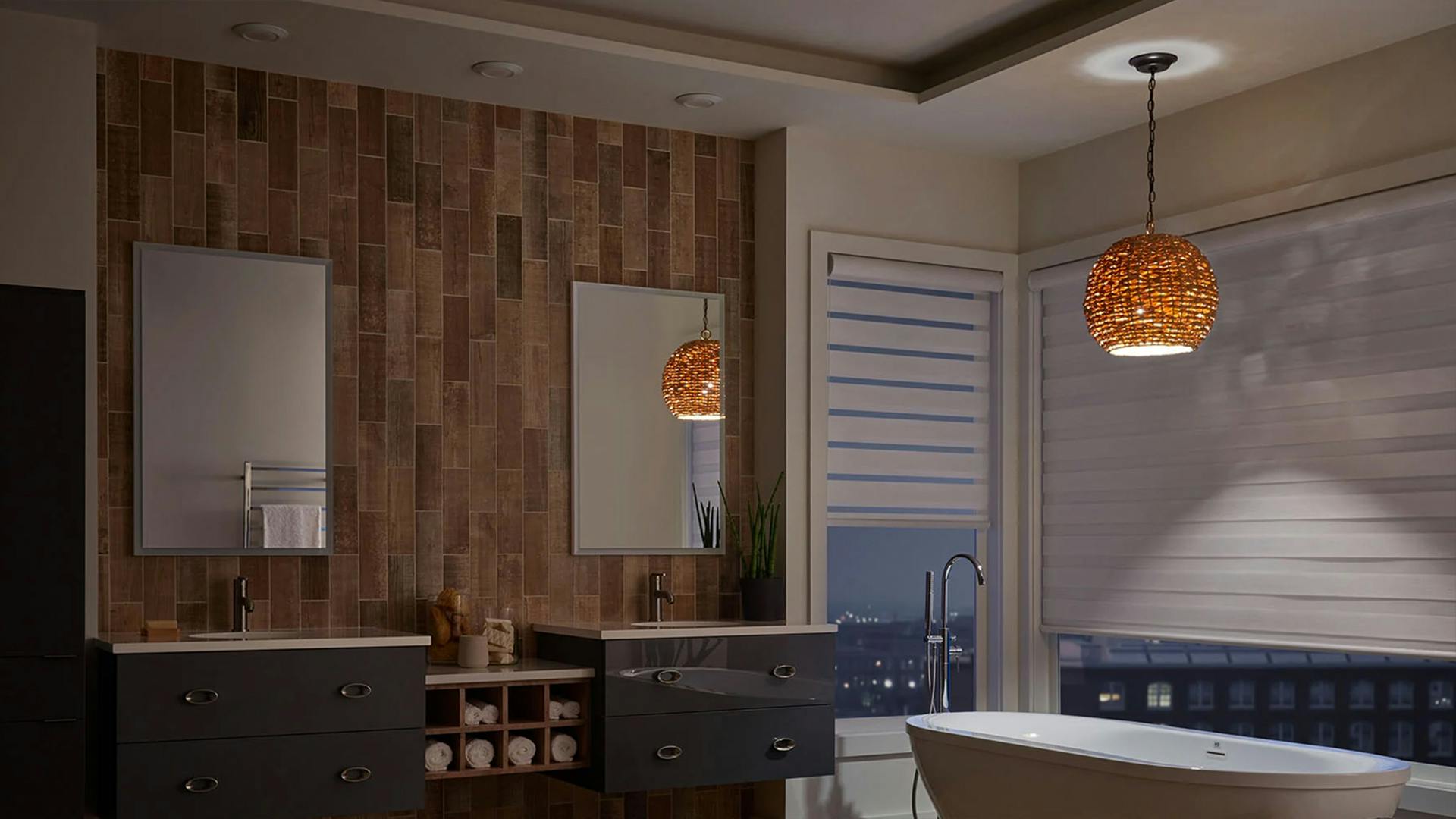 Bathroom illuminated by a Palisades pendant light above the bathtub