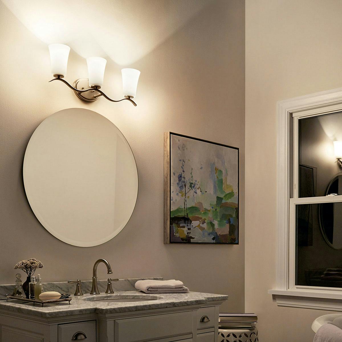 Night time Bathroom featuring Armida vanity light 45376NI
