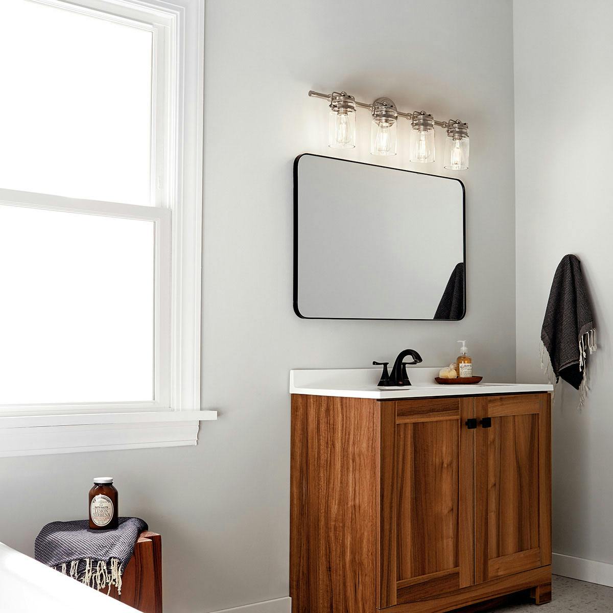 Day time Bathroom featuring Brinley vanity light 45690NI