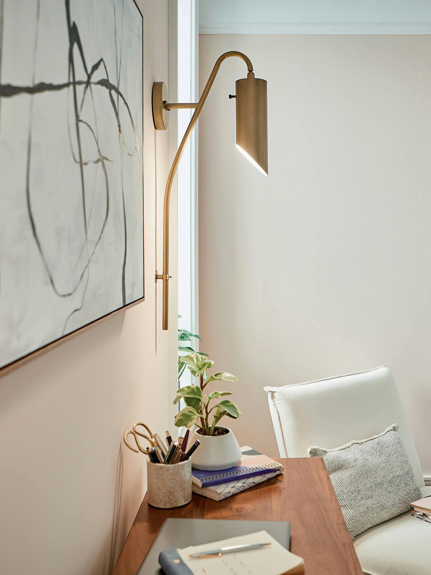 Trentino wall sconce in office during the day.