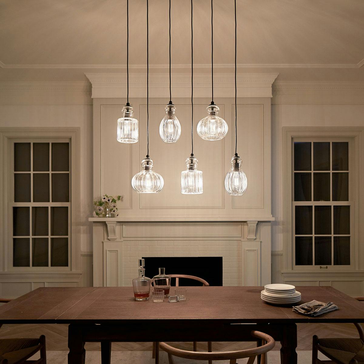 Night time dining room image featuring Riviera chandelier 43950OZ