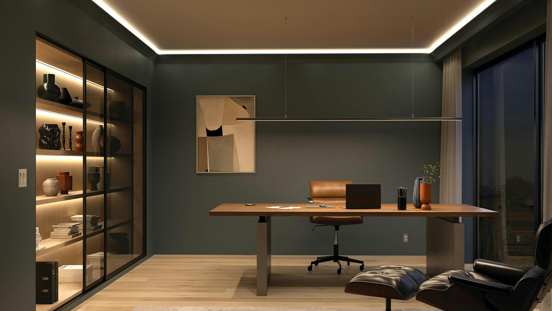  Office at night with channel lighting running along the ceiling trim