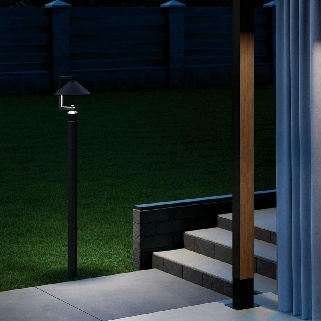 Porch at night with the Ripley 16" 1-Light Outdoor Post Light in  Black