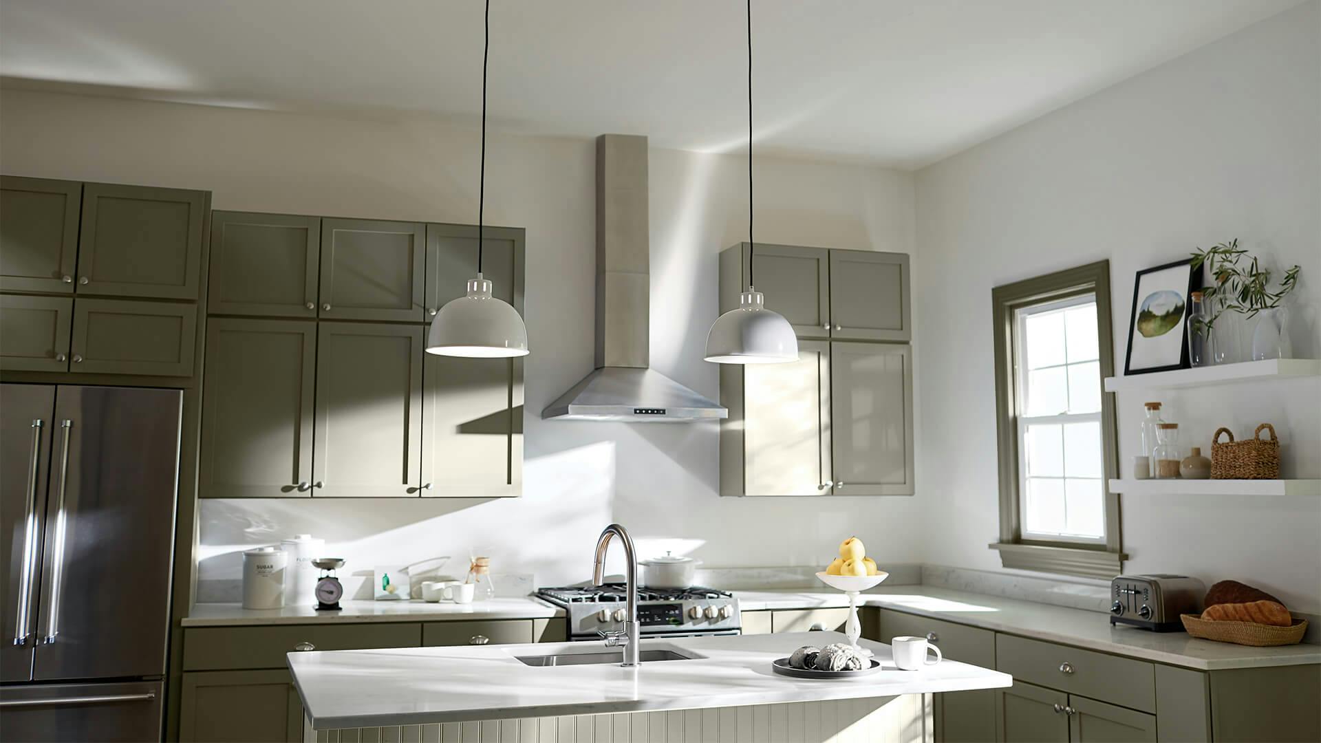 Two Zailey pendants above a kitchen island turned on in the daytime