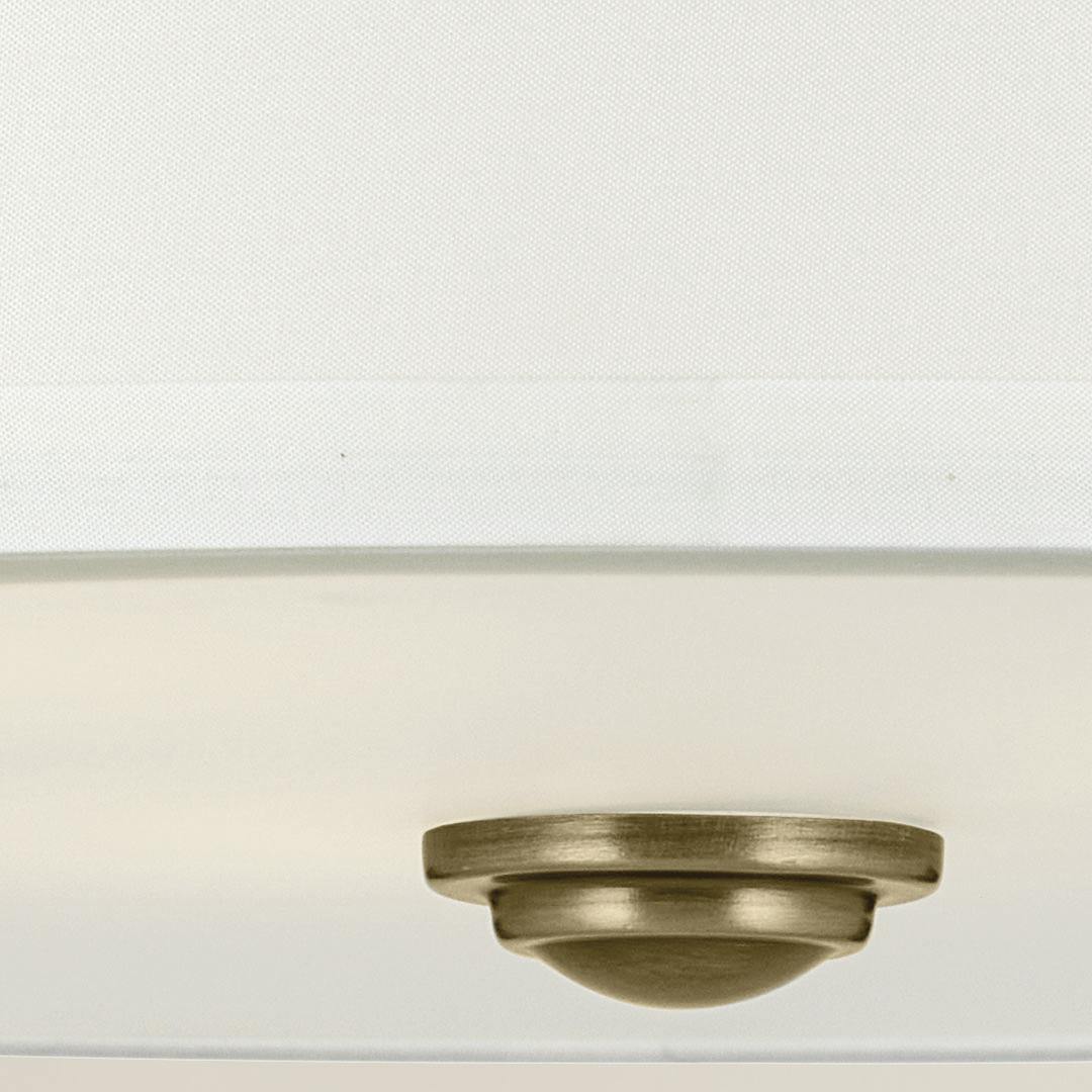 Close up view of the Shailene 11.5" 3-Light Small Round Semi Flush in Natural Brass
