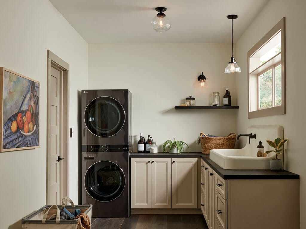 Laundry room in day light with the Avery 8.5 Inch 1 Light Bell Mini Pendant with Clear Seeded Glass in Black
