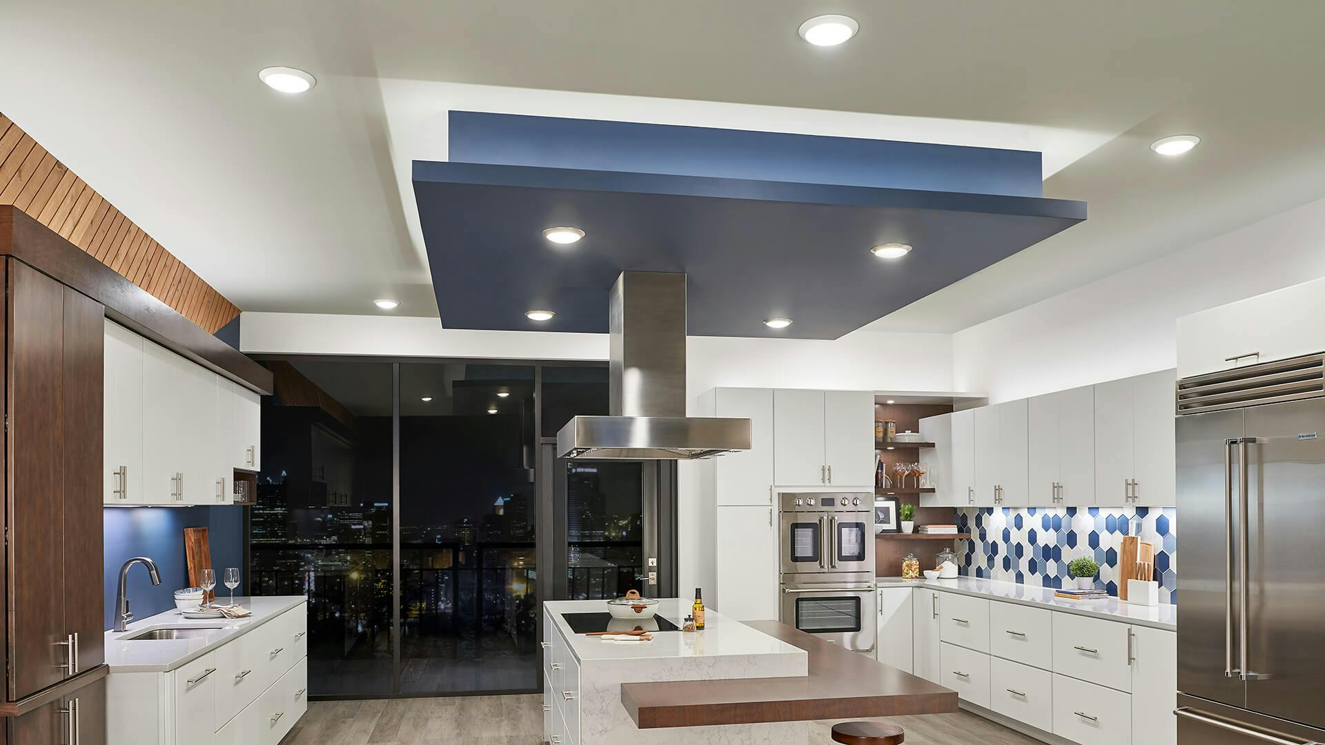 Open space kitchen with downlights.