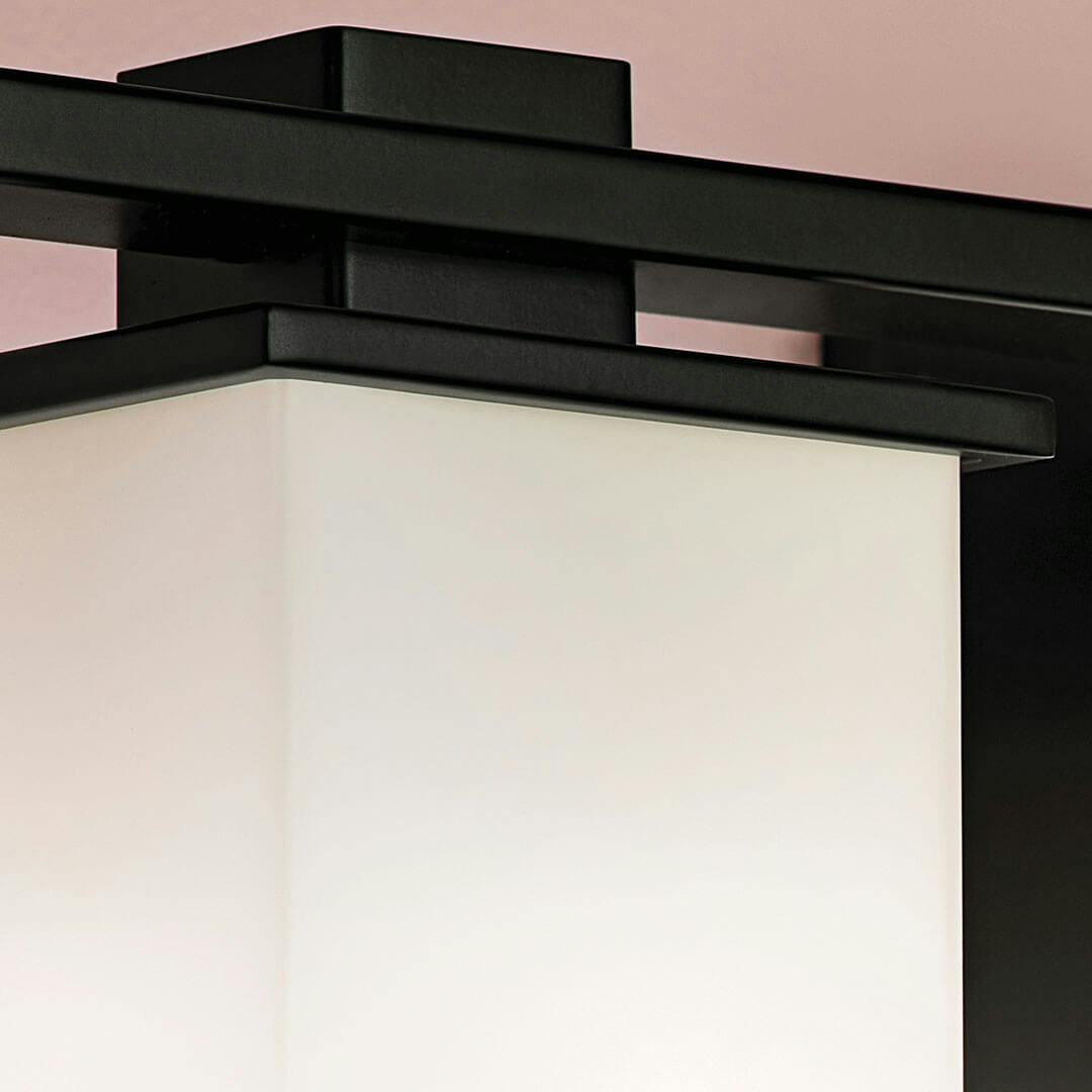 Close up view of the Tully 24" 3-Light Vanity Light in Black