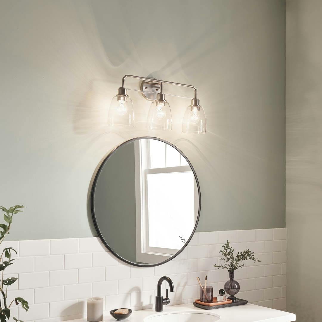 Day time bathroom with Meller 24.25 Inch 3 Light Vanity Light with Clear Glass in Brushed Nickel