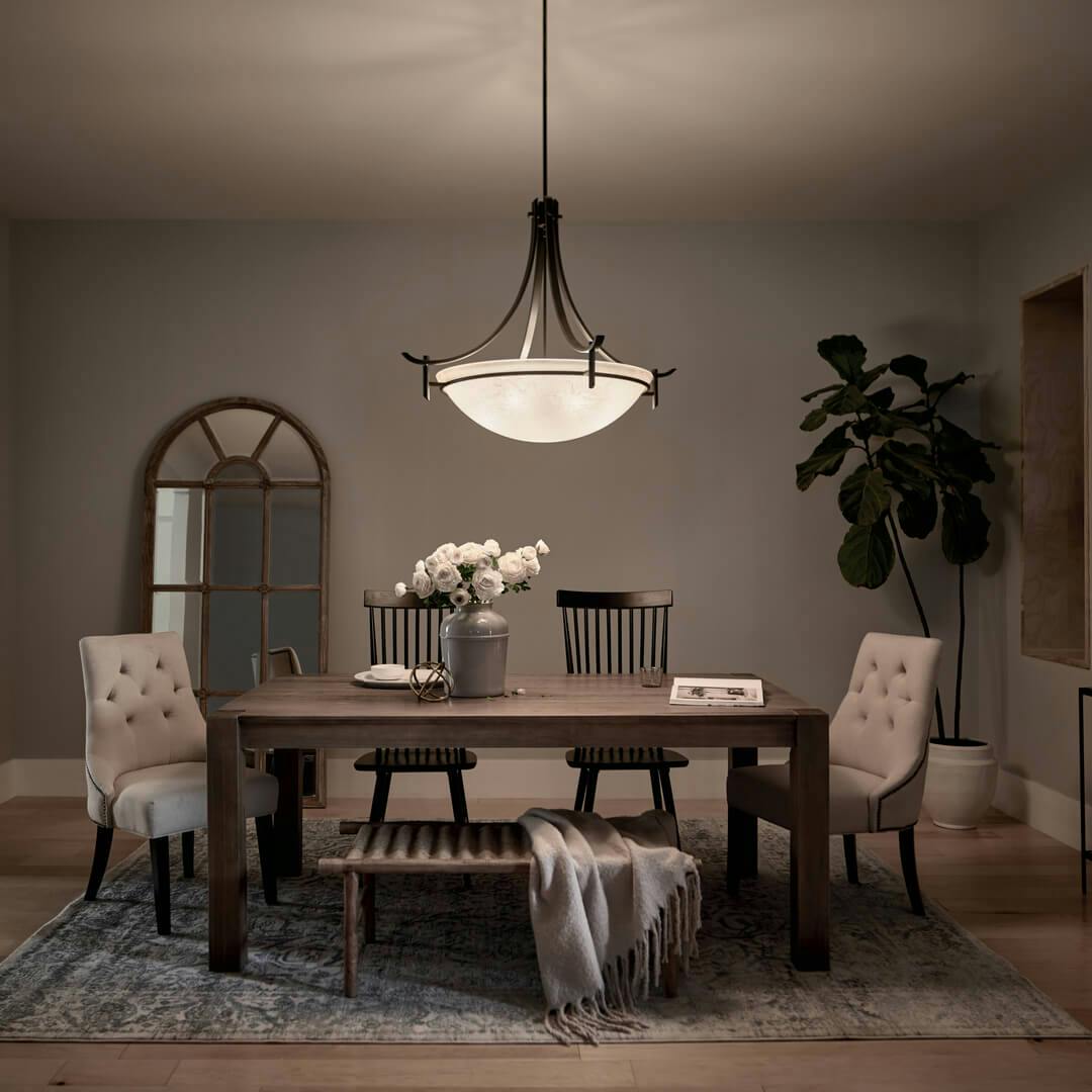 Night time dining room featuring the Olympia 5 Light Inverted Pendant Bronze