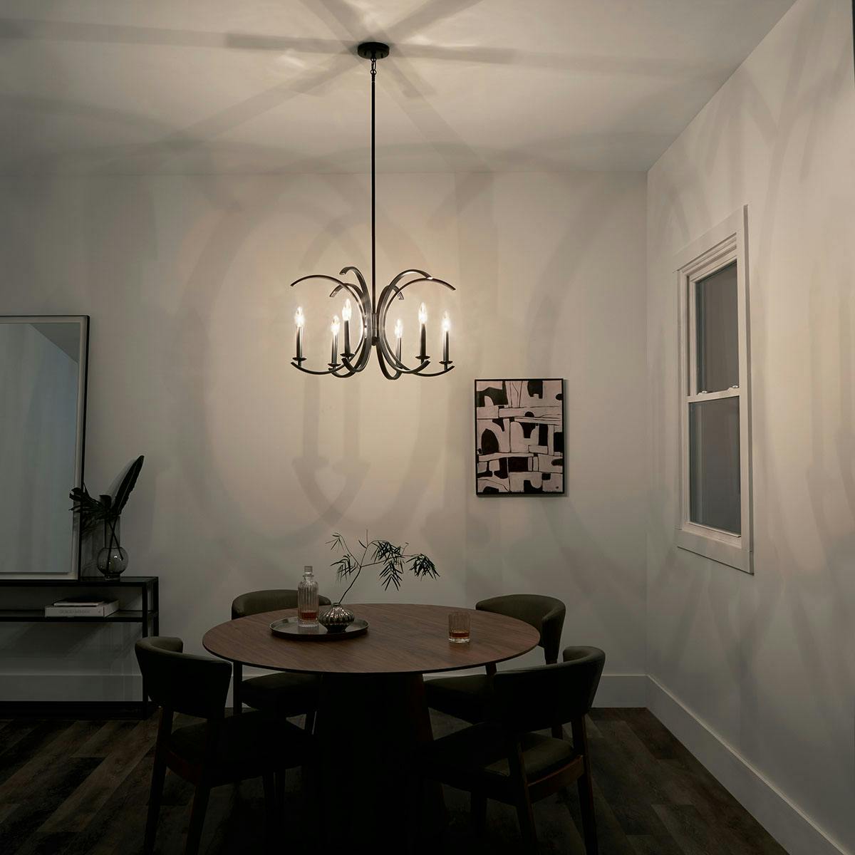 Night time dining room image featuring Cassadee chandelier 52116BK