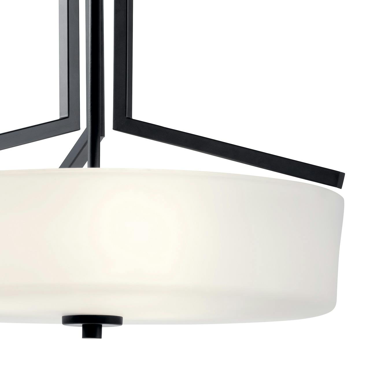Close up view of the Skagos™ 3 Light Pendant in Black on a white background