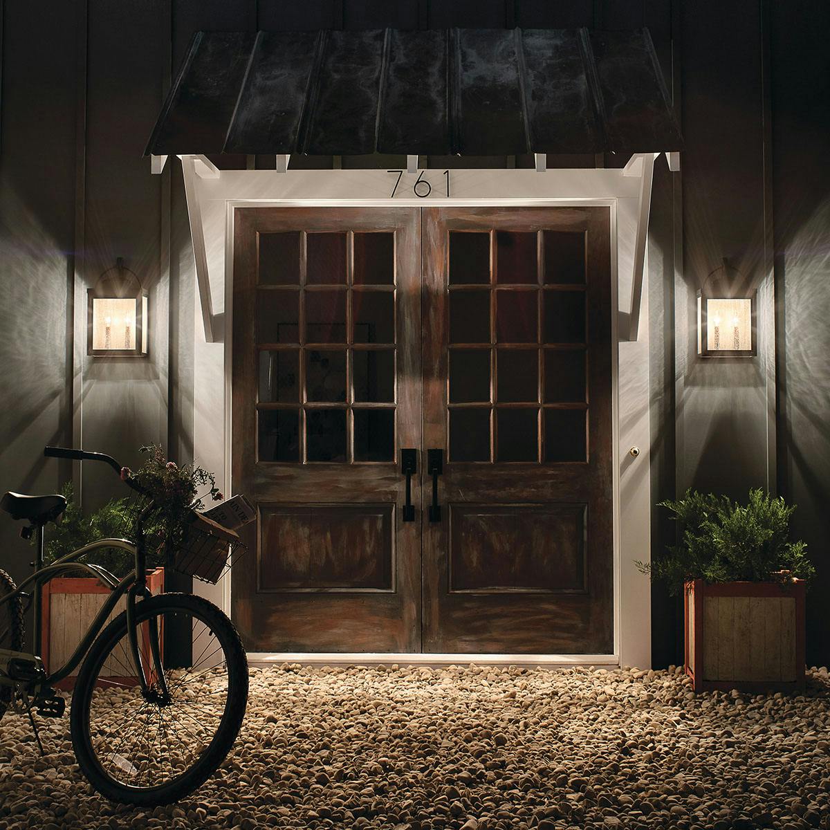 Night time outdoor entryway image featuring Carlson outdoor wall light 59012RZ