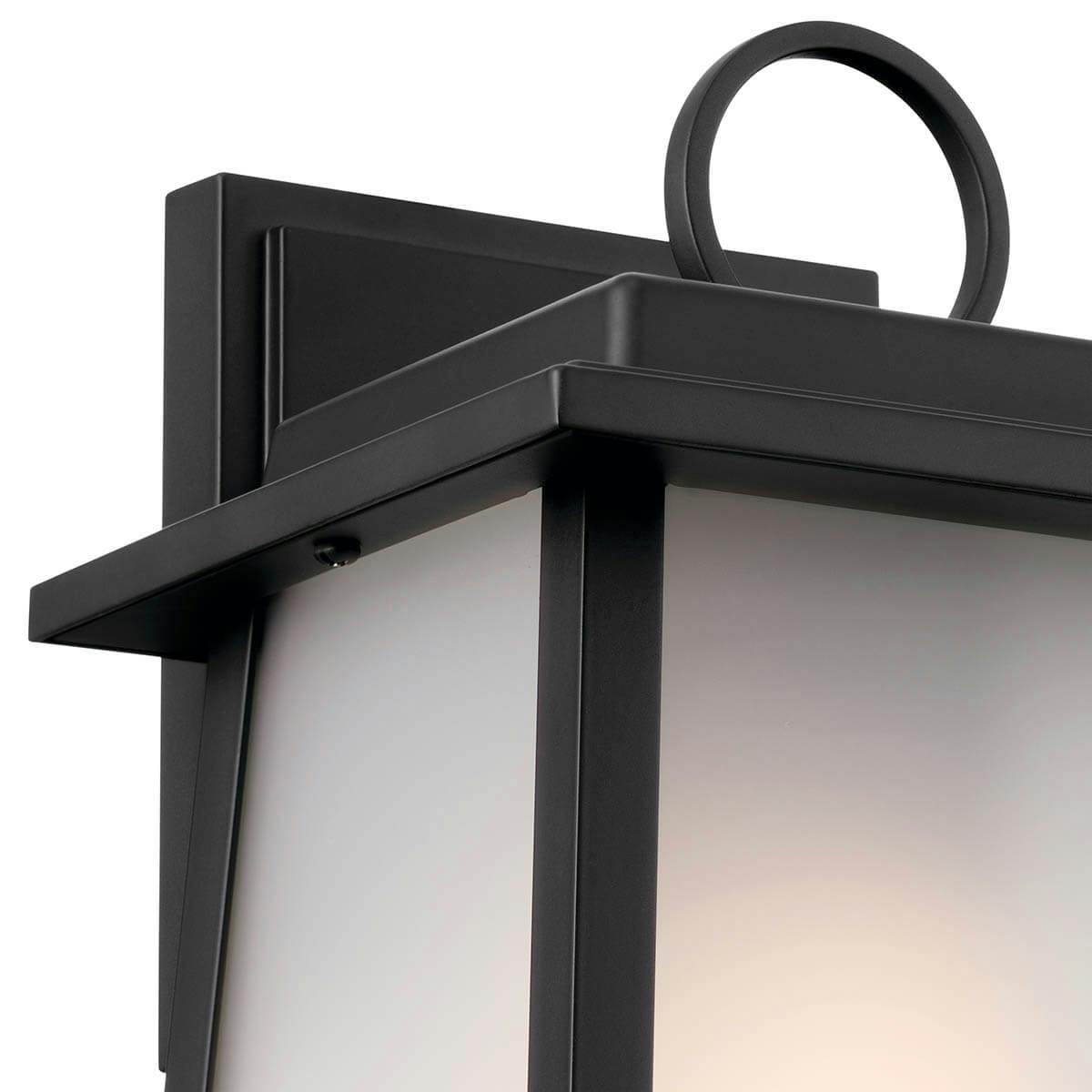 Close up view of the Noward 10.25" 1 Light Wall Light Black on a white background