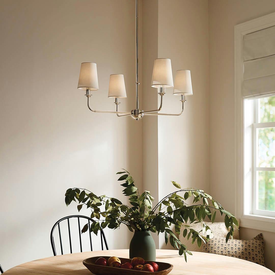 Day time breakfast nook with Pallas 25" 4 Light Chandelier Polished Nickel