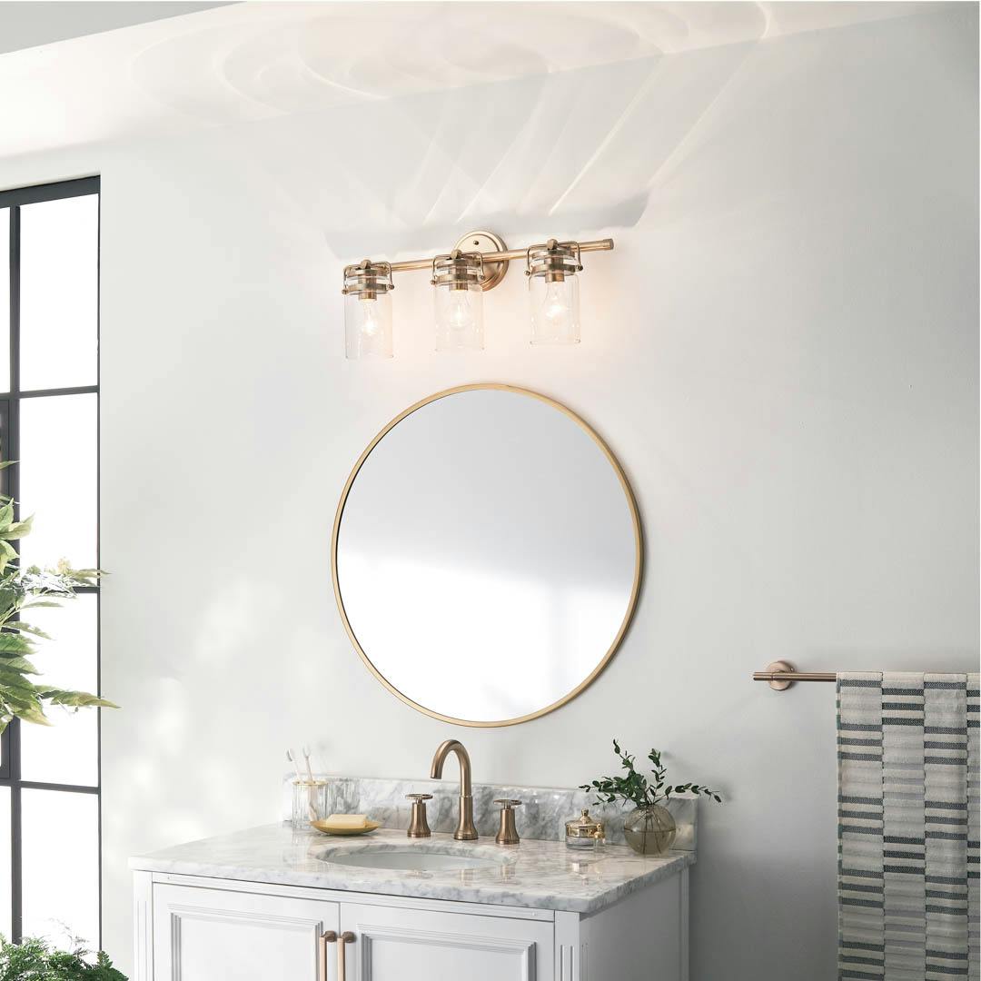 Day time bathroom with Brinley 24" 3 Light Vanity Light Champagne Bronze