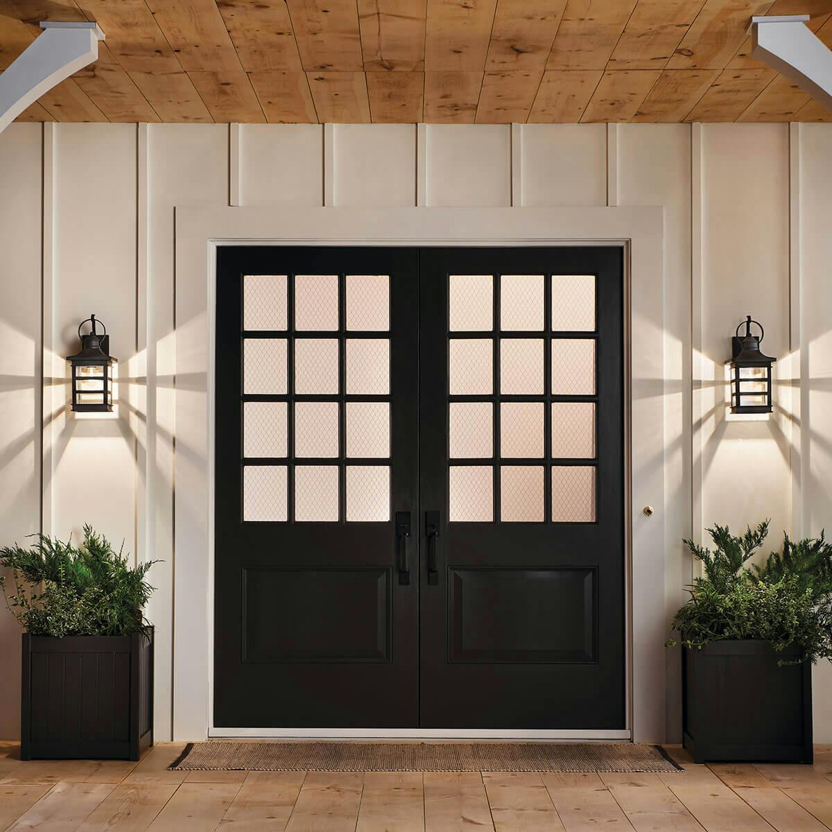 Night time outdoor entryway image featuring Grand Ridge outdoor wall light 39536