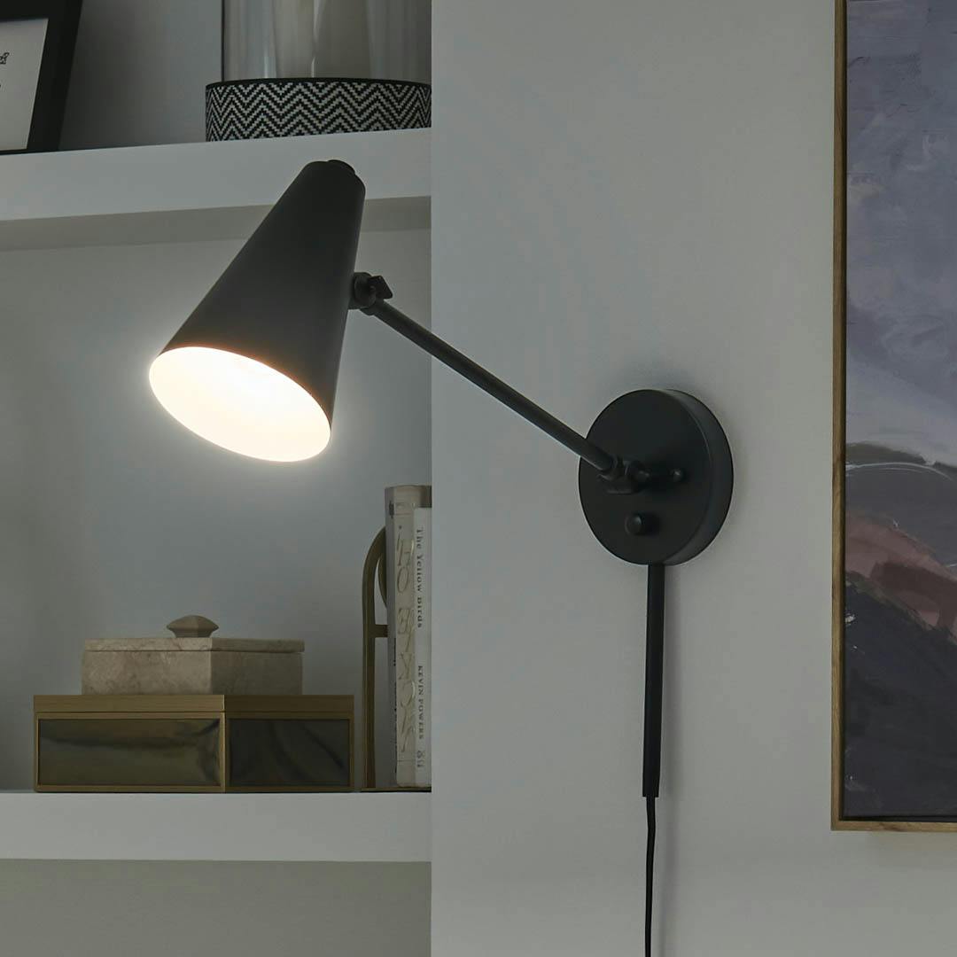 Night time office with Sylvia 1 Light Wall Sconce Black