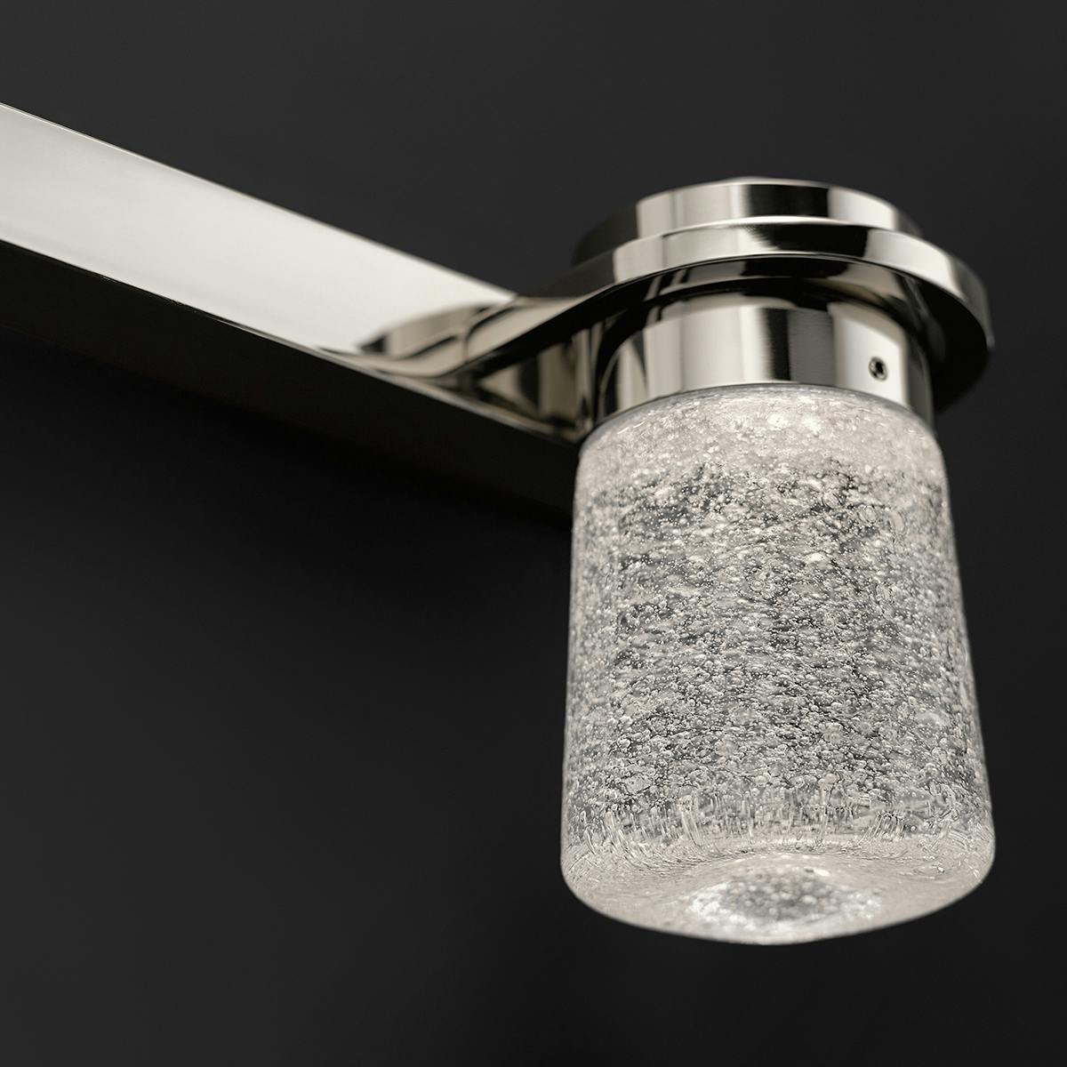 Close up view of the Vada 3000K 4 Light Vanity Light Nickel on a white background