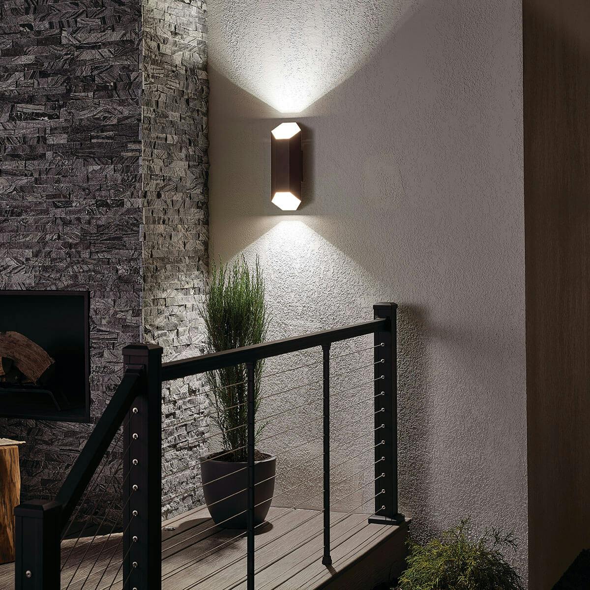 Night time outdoor entryway image featuring Estella outdoor wall light 49608AZTLED