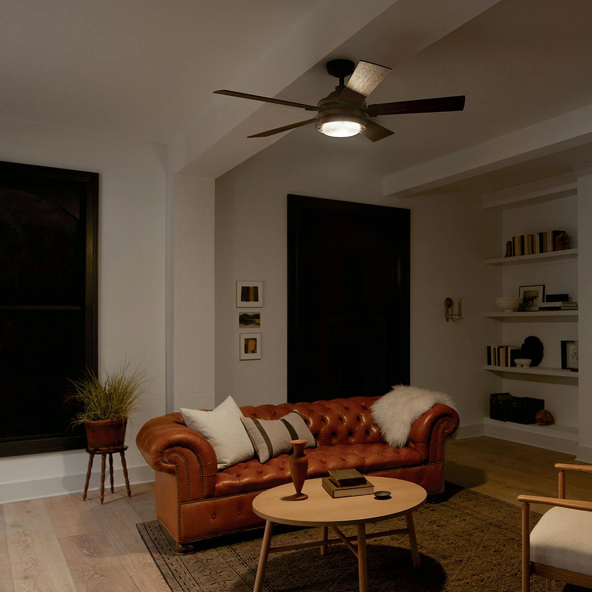 Night time living room with 52" Barrington LED Fan Distressed Black