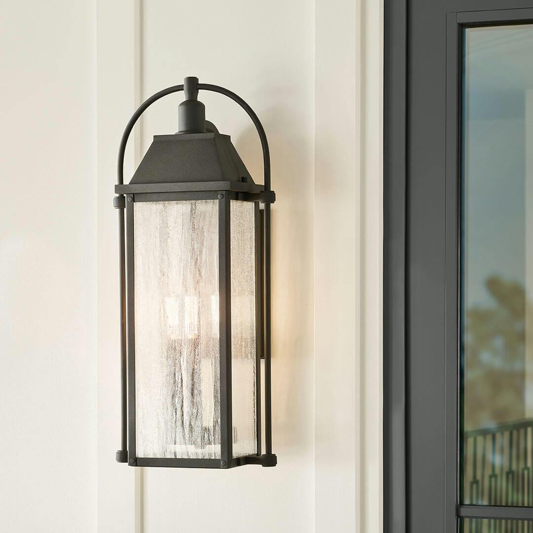 Home exterior in day light with the Harbor Row 28.75" 4-Light Outdoor Wall Light in Textured Black
