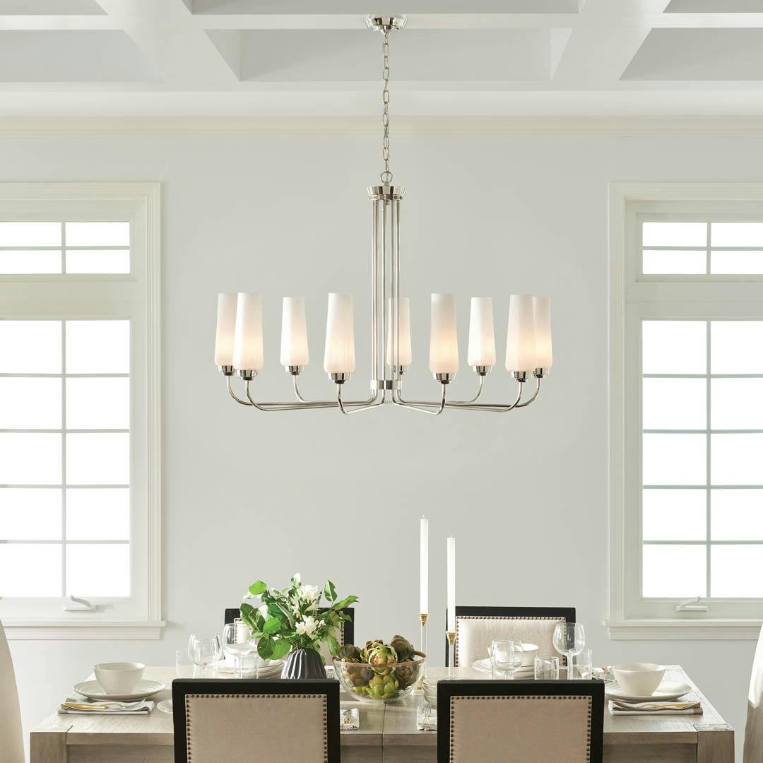 Day time dining room with Truby 9 Light Chandelier Polished Nickel