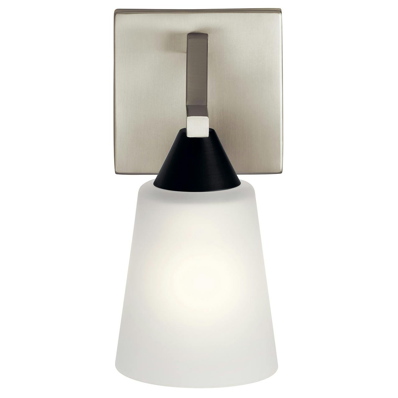 The Skagos 1 Light Wall Sconce Brushed Nickel facing down on a white background