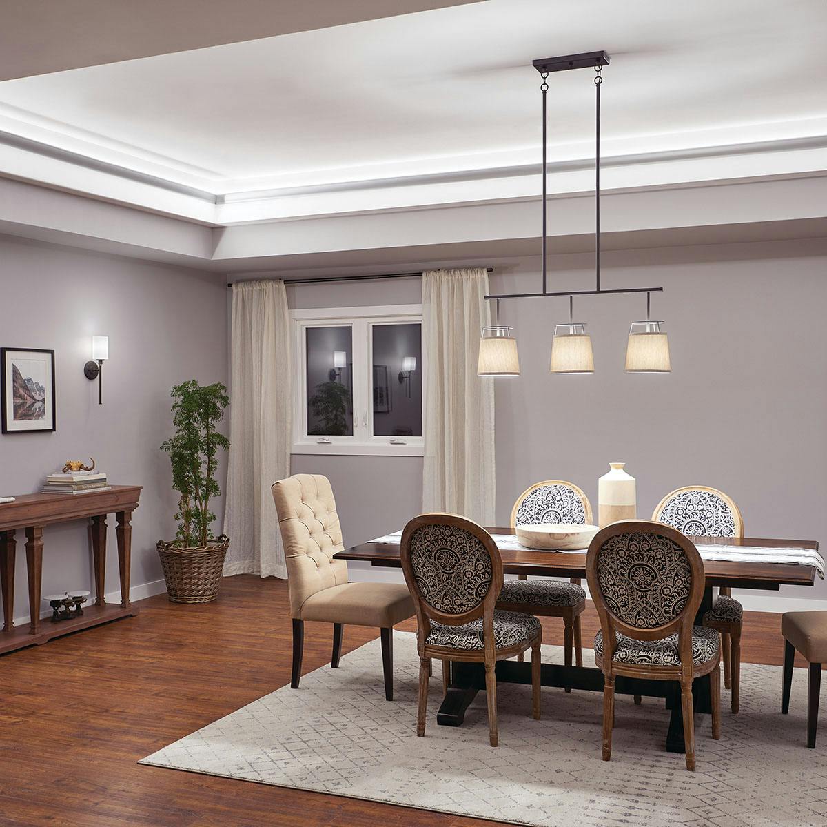 Night time dining room featuring Marika 52263OZ Joelson-45921OZ  and channels 1TEC2M2SF8SIL
