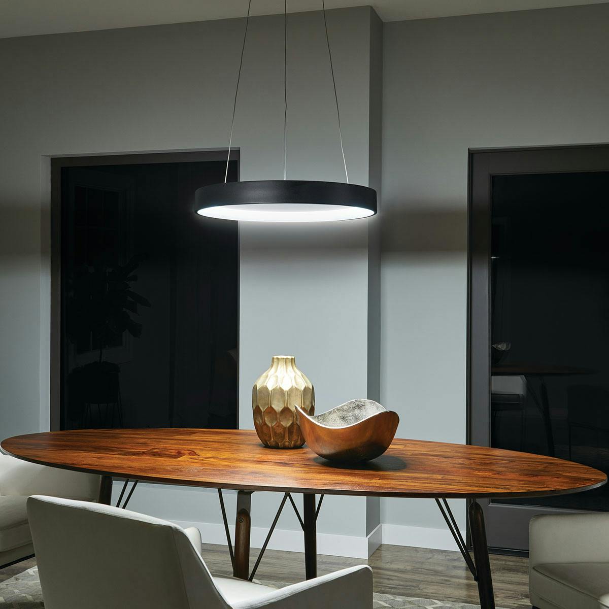 Night time dining room image featuring Fornello pendant 83455