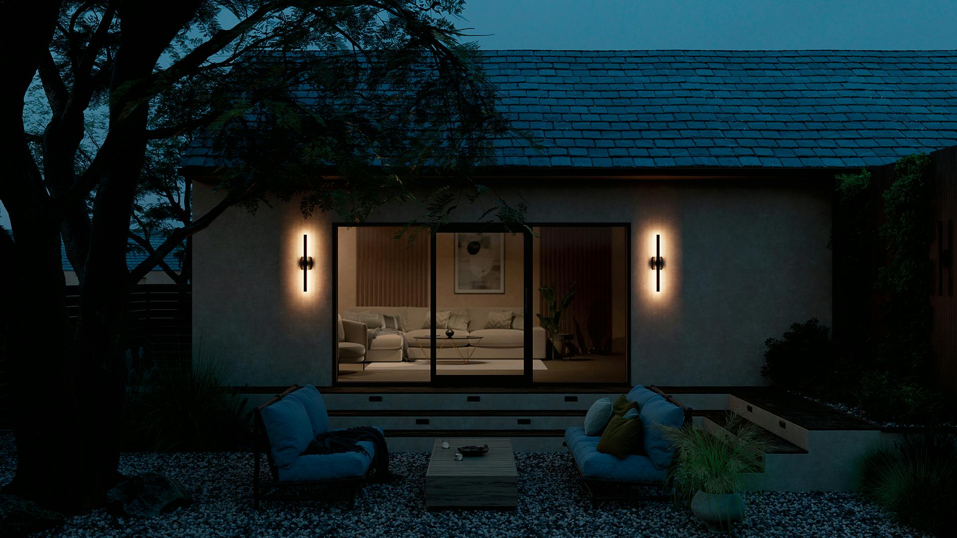 Patio at dusk with Nocar sconces.