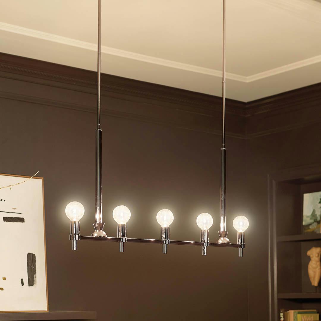 Night time dining room with Torvee 41 Inch 6 Light Chandelier in Polished Nickel
