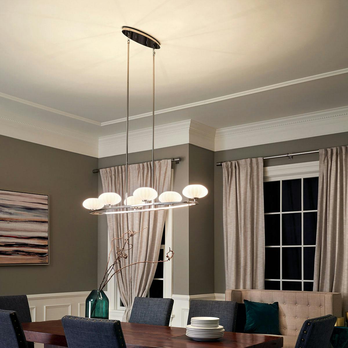 Night time dining room image featuring Pim chandelier 52224PN
