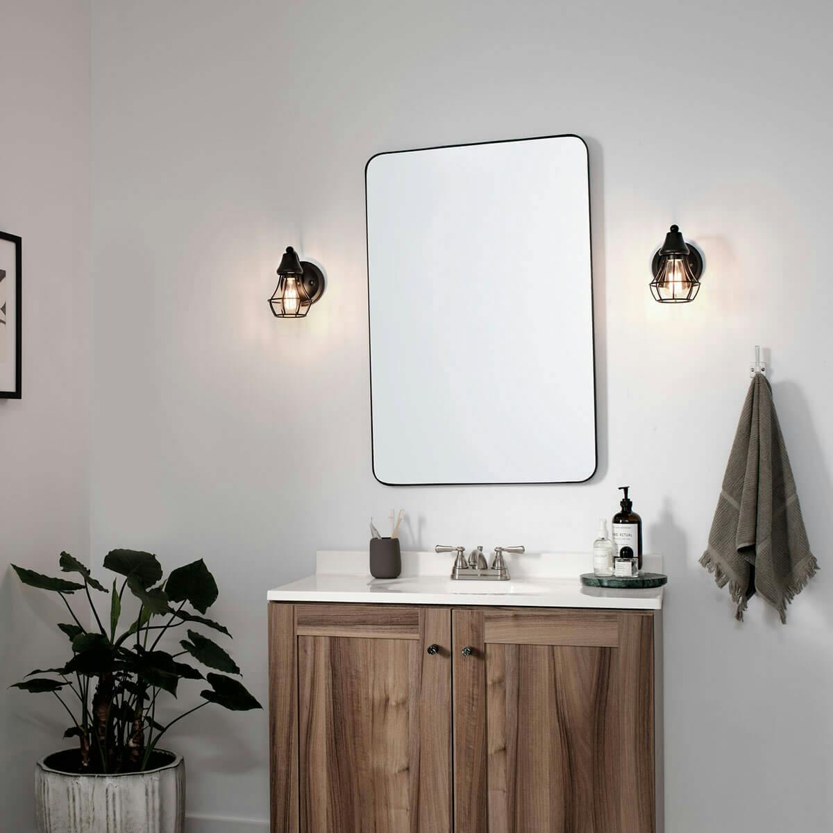 Day time Bathroom featuring Bayley vanity light 37512BK