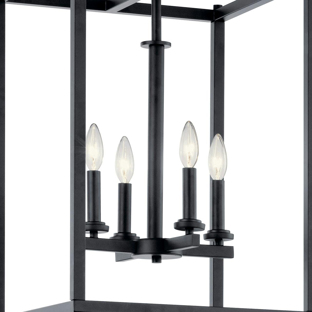 Close up view of the Crosby 4 Light Foyer Pendant Black on a white background