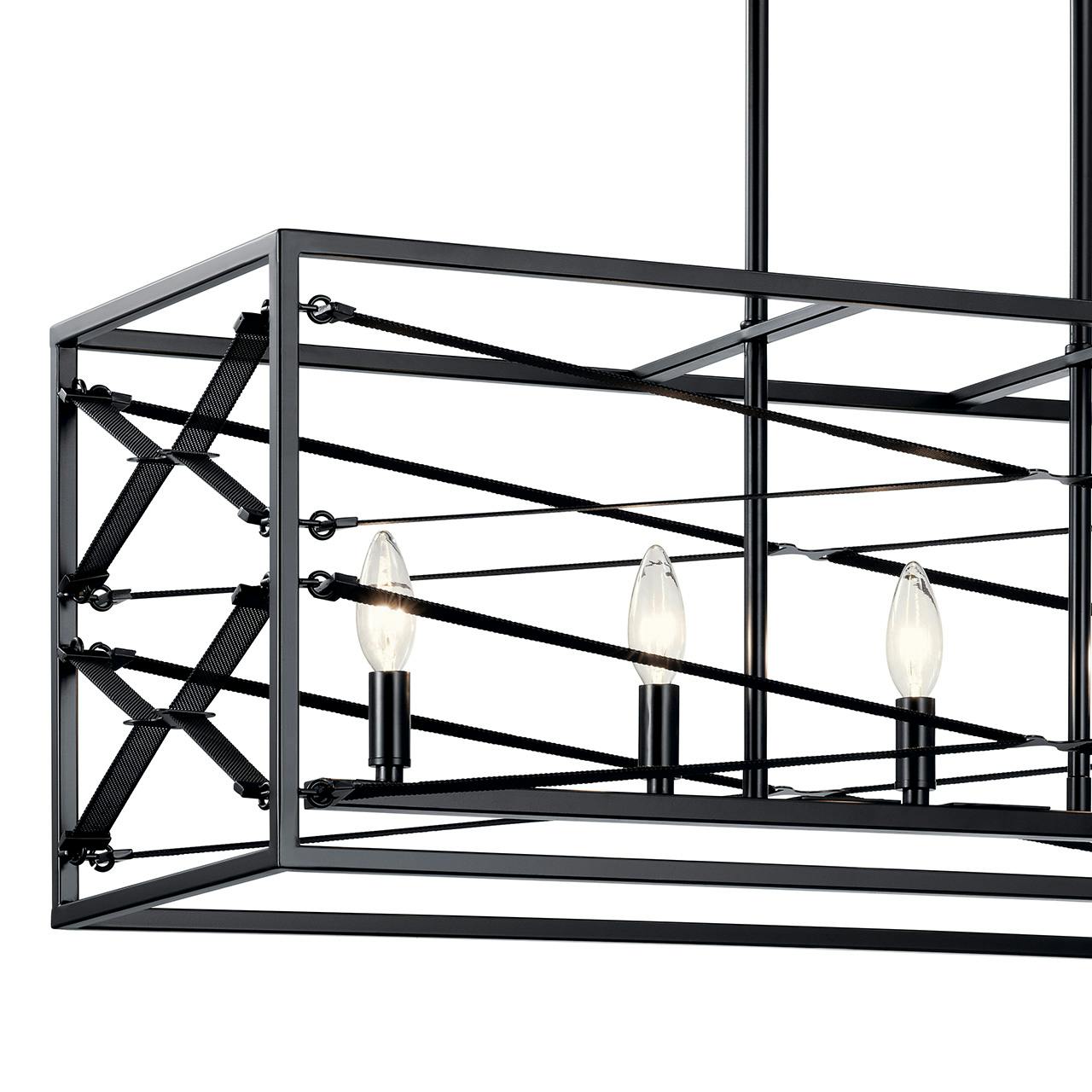 Close up view of the Sevan™ 5 Light Linear Chandelier Black on a white background
