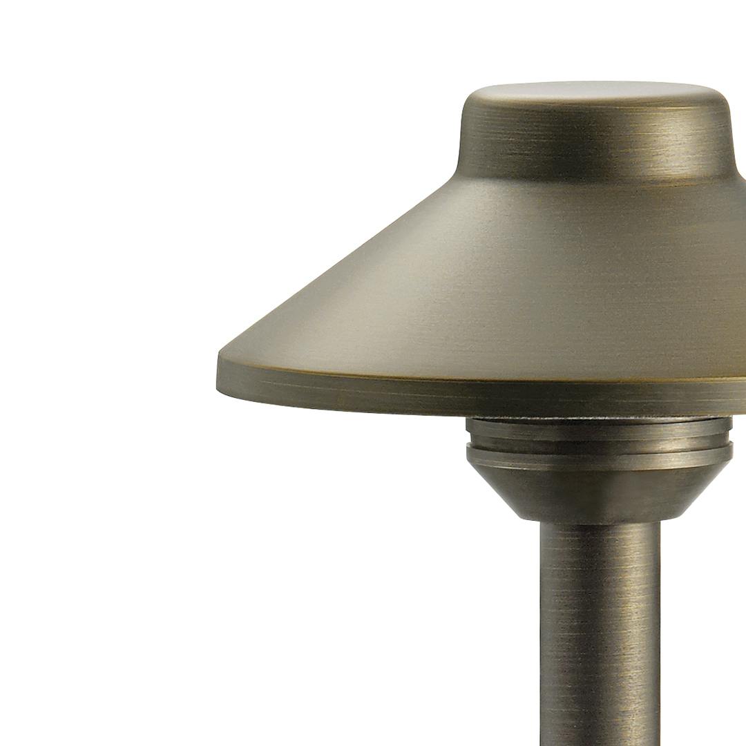 Close up of Stepped Dome Path Light Centennial Brass on a white background