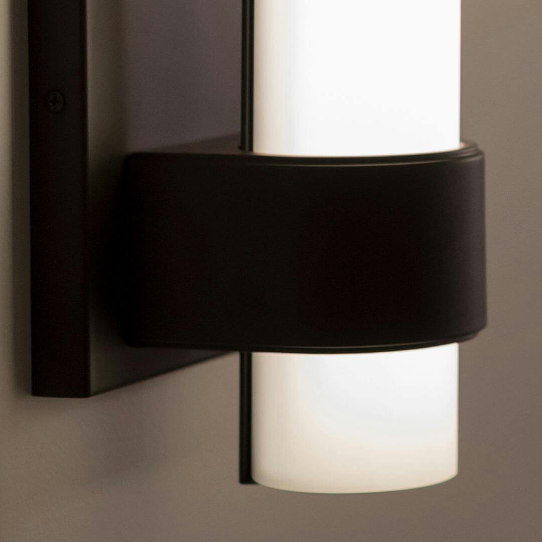 Izza™ LED Wall Sconce in Bronze on a white background