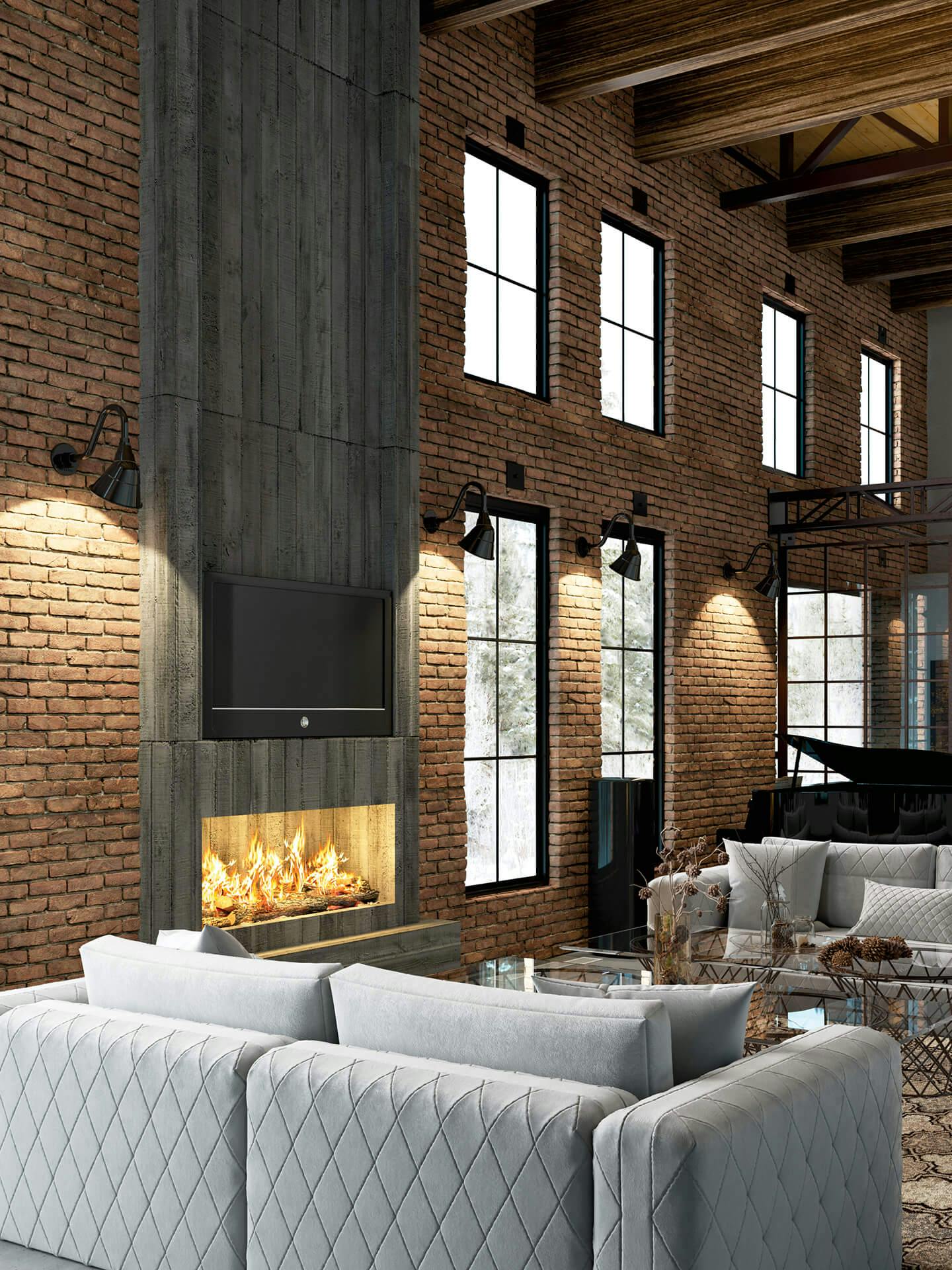 Industrial loft living room with two story tall ceiling, brick wall and fire place