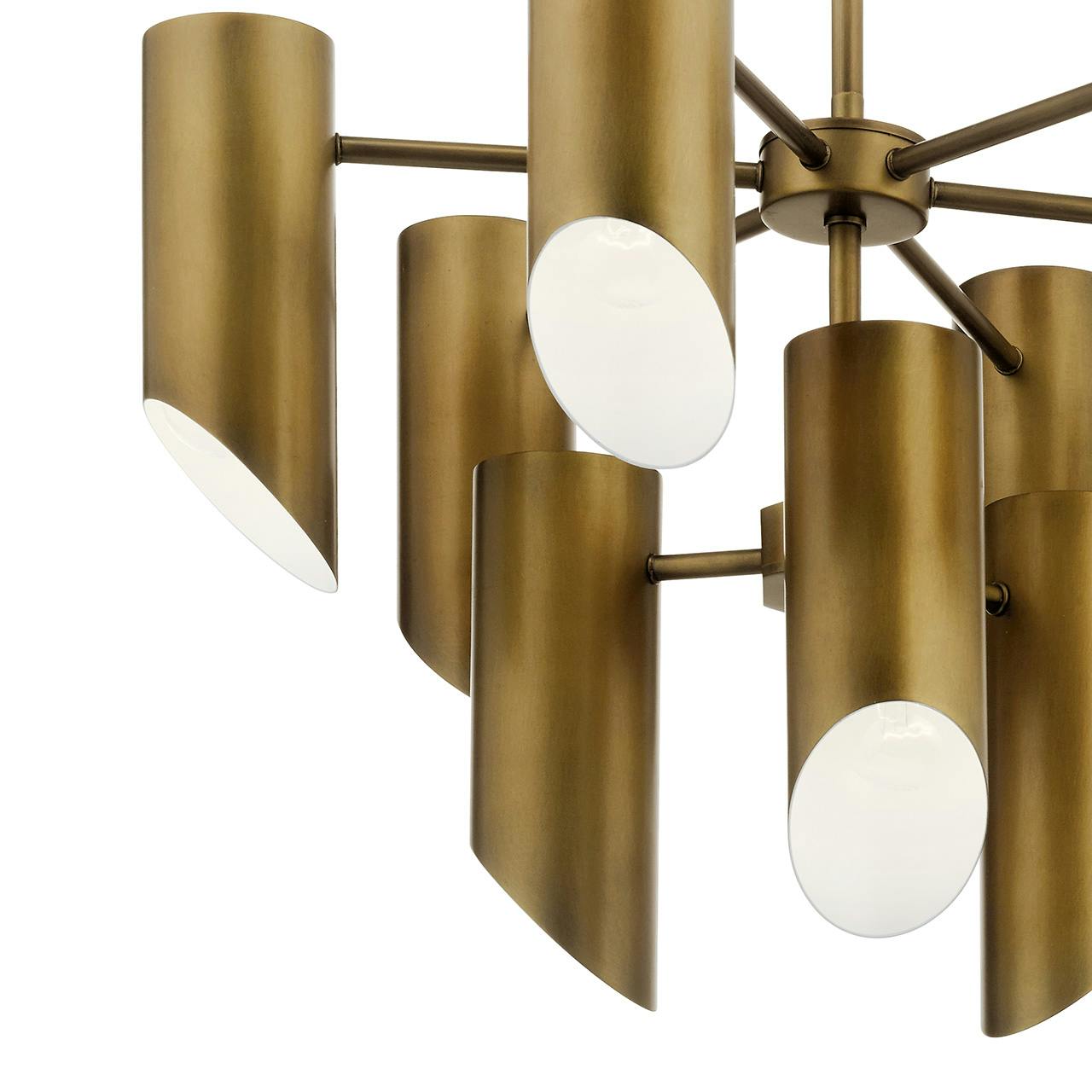 Close up view of the Trentino 9 Light Chandelier Natural Brass on a white background