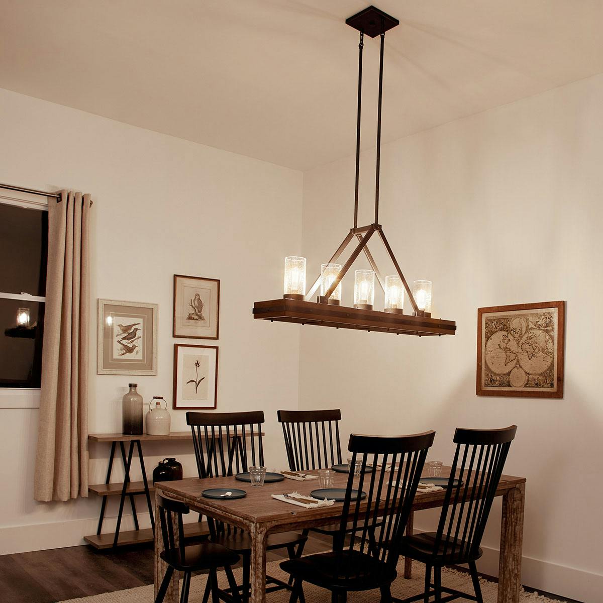 Night time dining room image featuring Colerne chandelier 43491AUB