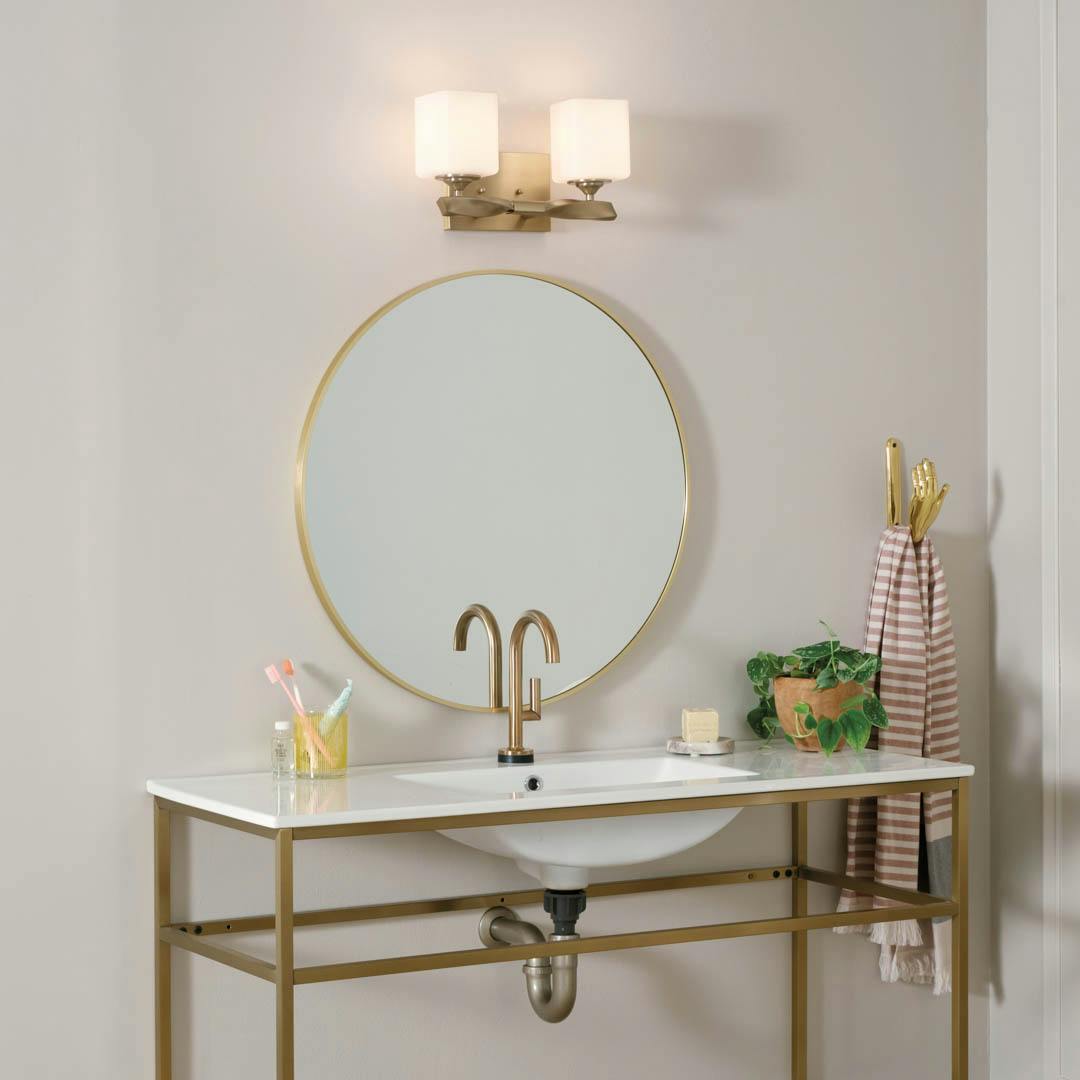 Day time bathroom with Marette 13.5 inch 2 Light Vanity Light with Satin Etched Cased Opal Glass in Champagne Bronze