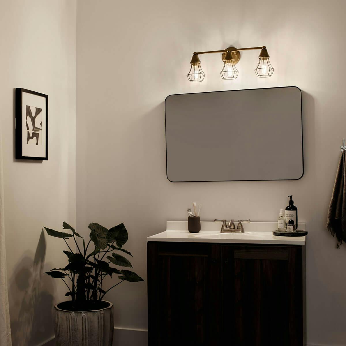 Night time Bathroom featuring Bayley vanity light 37509NBR