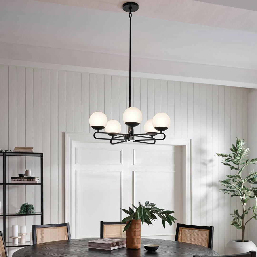 Day time dining room with Ekero 5 Light Black Chandelier With Satin-Etched Cased Opal Glass