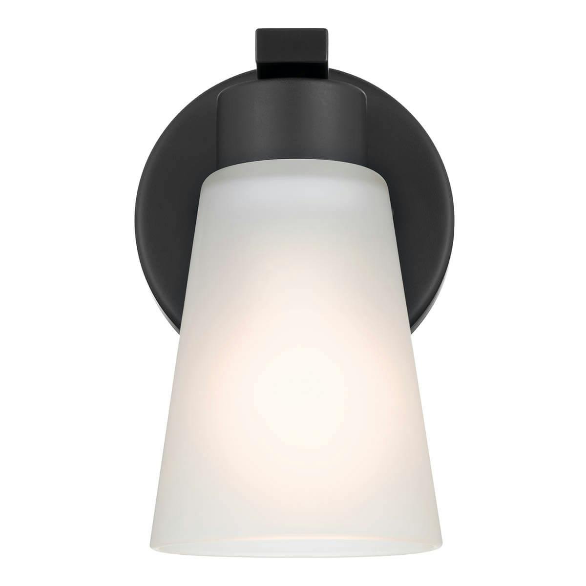 Front view of the Stamos 4.25" 1 Light Wall Sconce Black on a white background