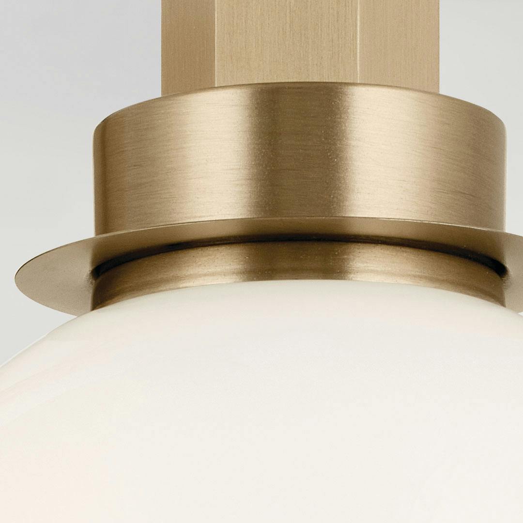 Close up view of the Hex 11.5 Inch 1 Light Wall Sconce with Opal Glass in Champagne Bronze