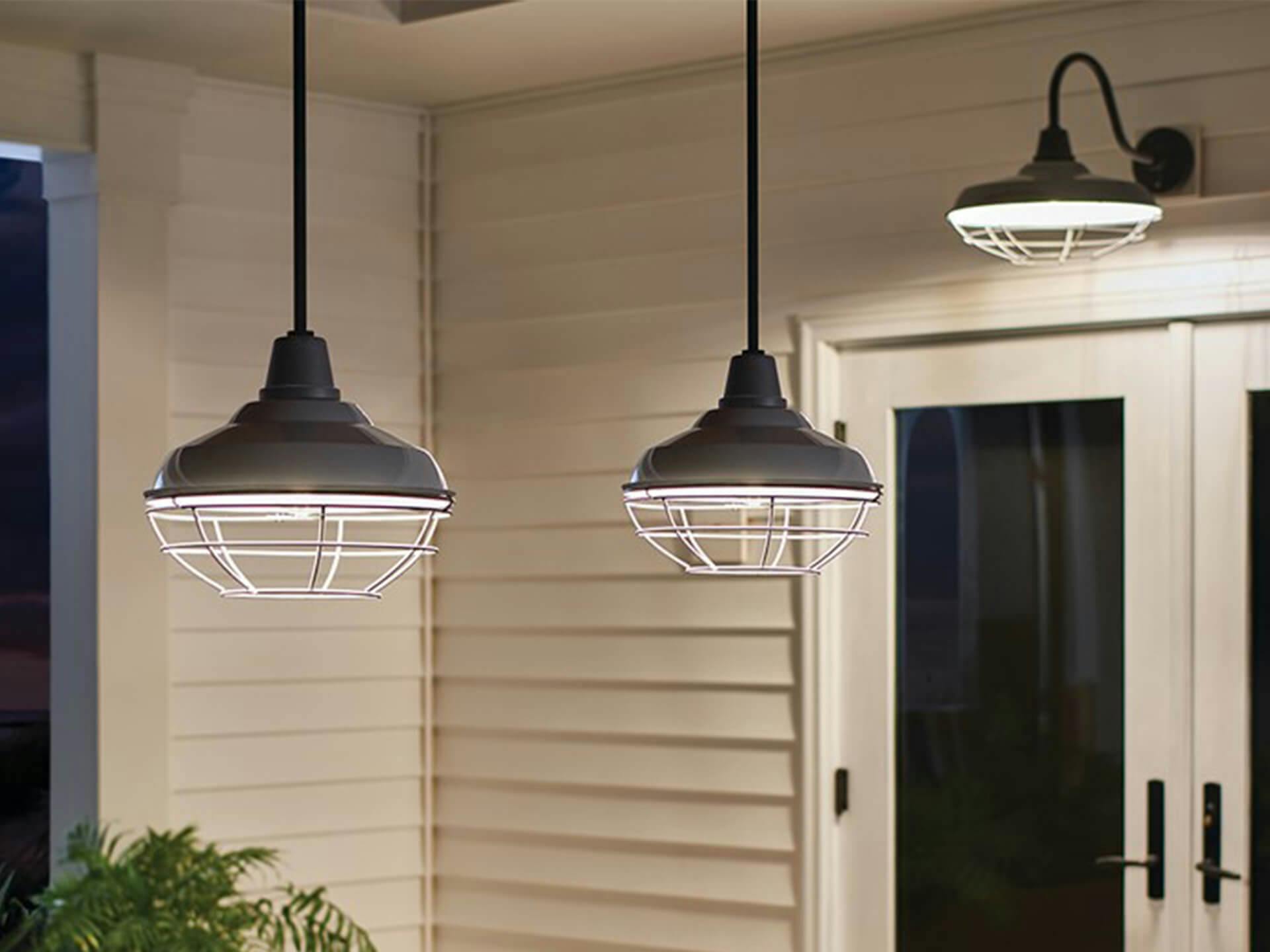 Porch at night with Pier pendant lights and sconce