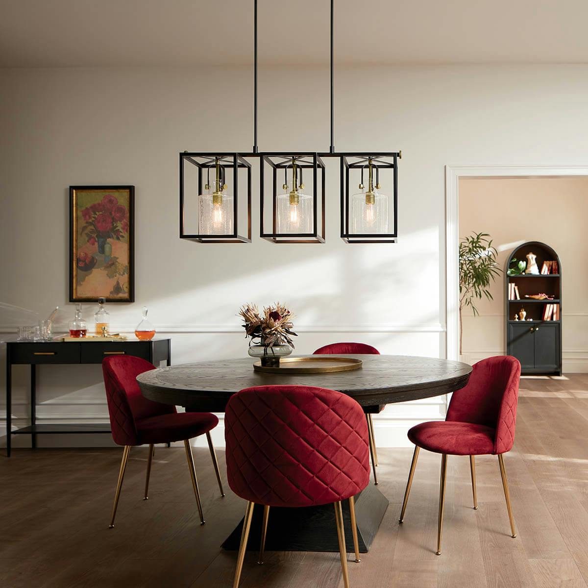 Day time dining room with Kitner 3 light chandelier Natural Brass