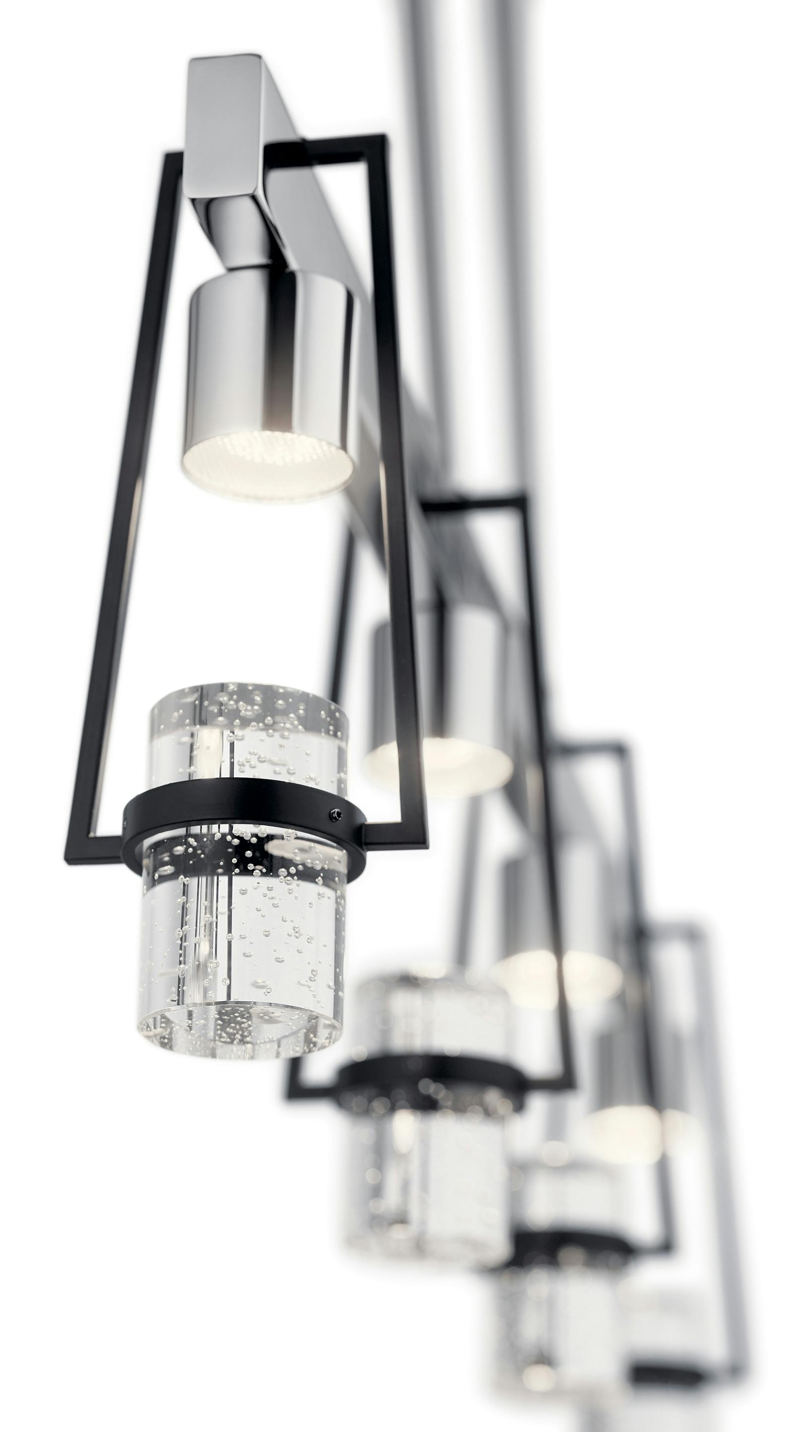 Close up view of the Ayse 4 Light Linear Pendant Matte Black on a white background